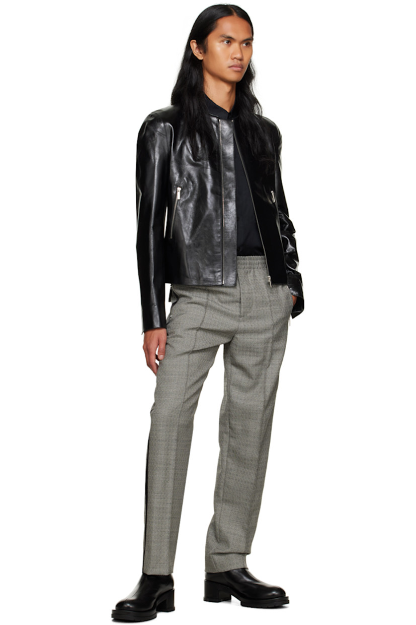 Semi-sheer cupro twill shirt.

· Spread collar
· Button closure
· Vented side seams
· Vent at four-button surgeon's cuffs

Supplier color: Black