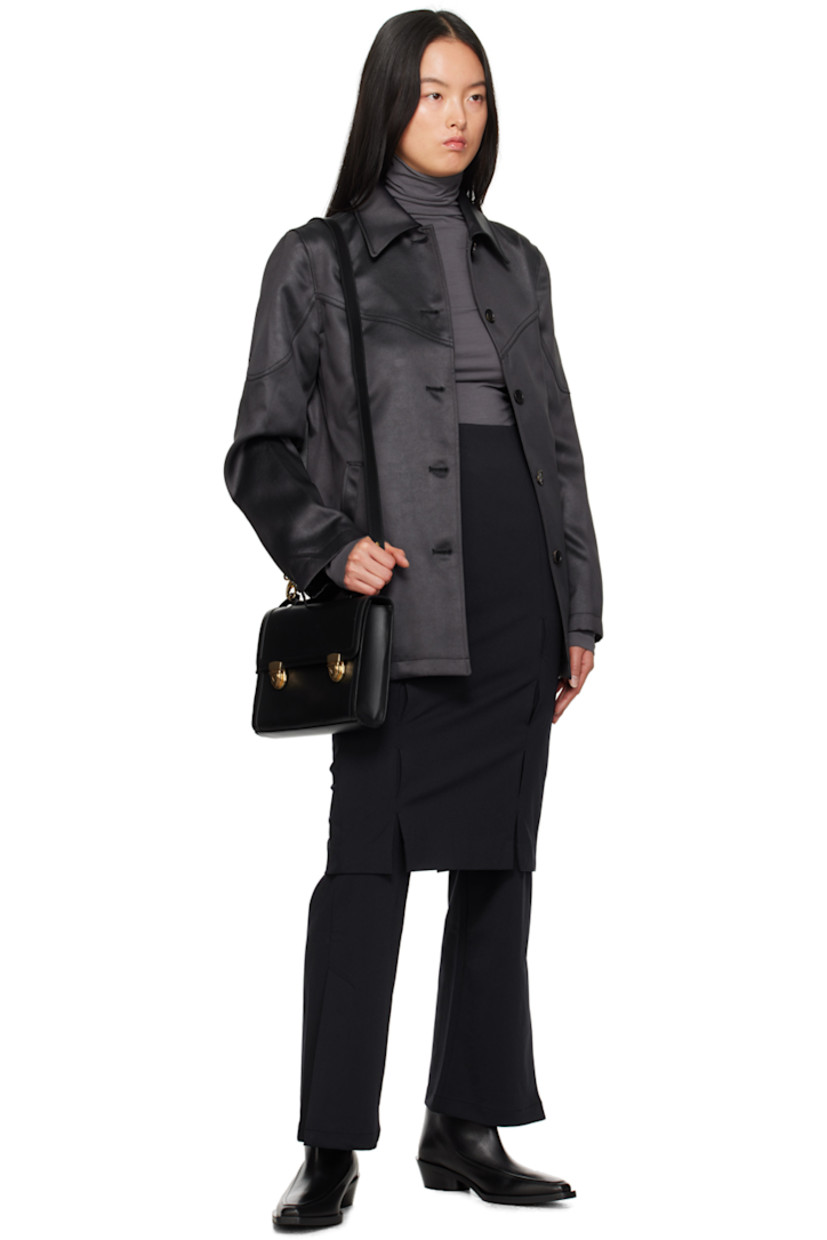 Stretch nylon jersey skirt.

· High-rise
· Belt loops
· Adjustable press-stud tabs at waistband
· Two-pocket styling
· Zip-fly
· Twin vents at front
· Central vent at back hem
· Partial cupro satin lining

Supplier color: Navy