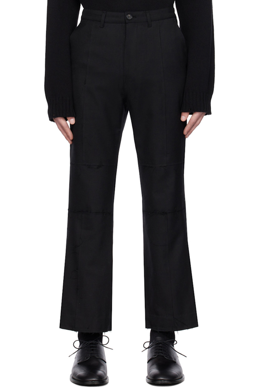Polyester- and rayon-blend twill trousers. Loose thread detailing throughout.

· Paneled construction
· Belt loops
· Four-pocket styling
· Zip-fly
· Raw edge and subtle flare at cuffs

Supplier color: Black