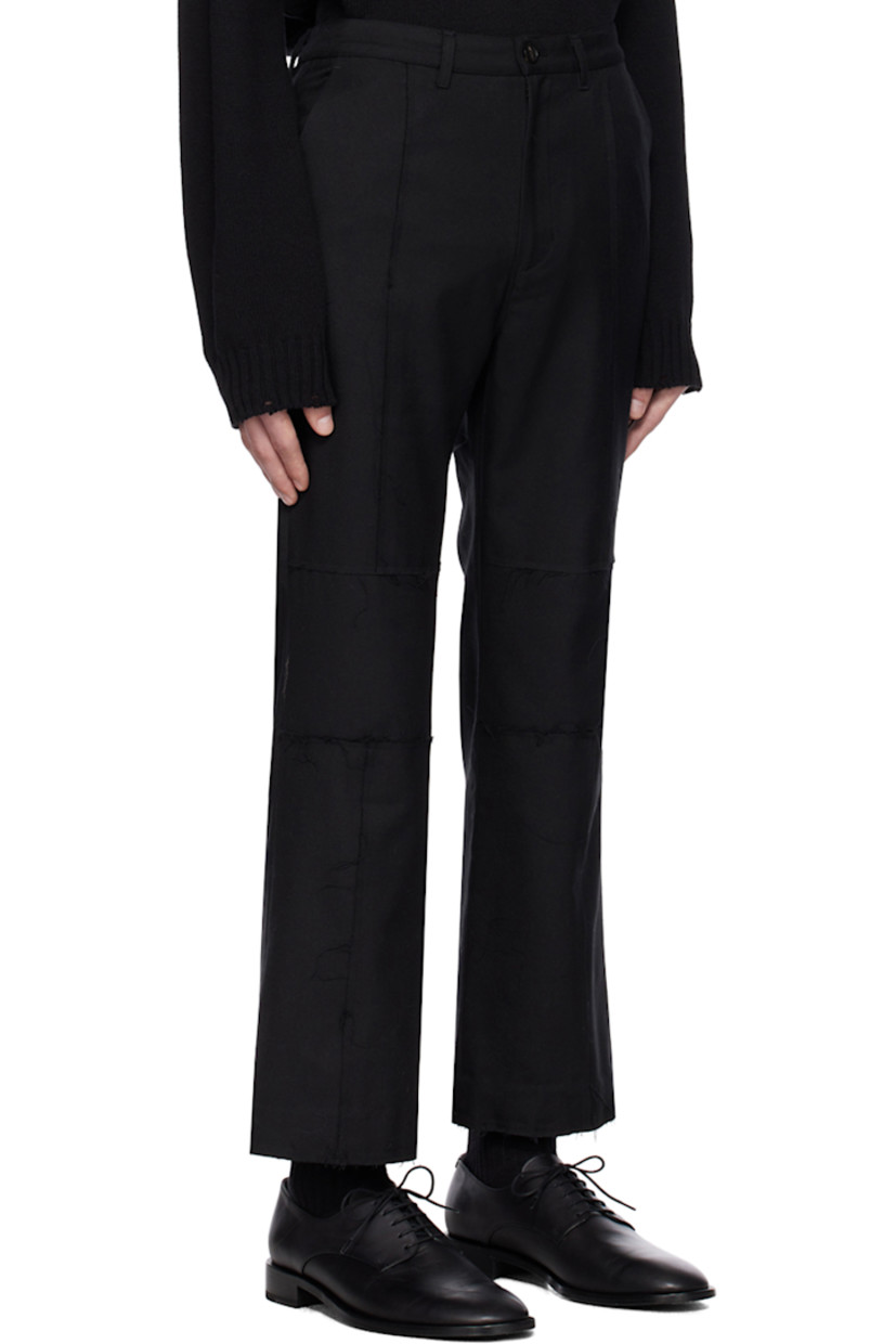 Polyester- and rayon-blend twill trousers. Loose thread detailing throughout.

· Paneled construction
· Belt loops
· Four-pocket styling
· Zip-fly
· Raw edge and subtle flare at cuffs

Supplier color: Black