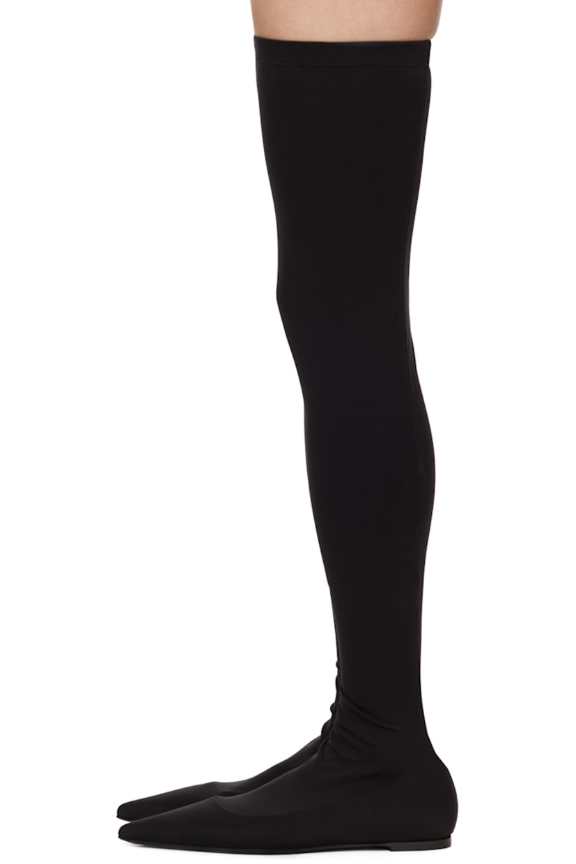 Thigh-high stretch jersey boots in black.

· Pointed toe
· Non-slip trim at elasticized collar
· Kidskin insole
· Stacked leather block heel
· Leather sole

Supplier color: Nero