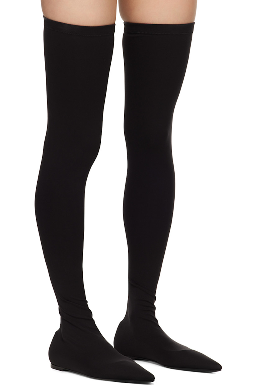 Thigh-high stretch jersey boots in black.

· Pointed toe
· Non-slip trim at elasticized collar
· Kidskin insole
· Stacked leather block heel
· Leather sole

Supplier color: Nero