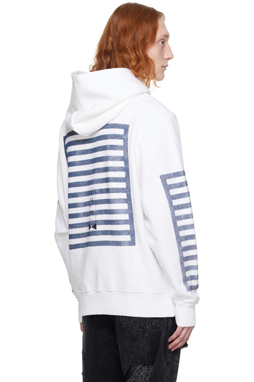 French terry hoodie. Exposed seams throughout.

· Logo and graphic printed throughout
· Rib knit hem and cuffs
· Seam pockets
· Dropped shoulders
· Full jersey lining

Supplier color: Bianco/Ottico