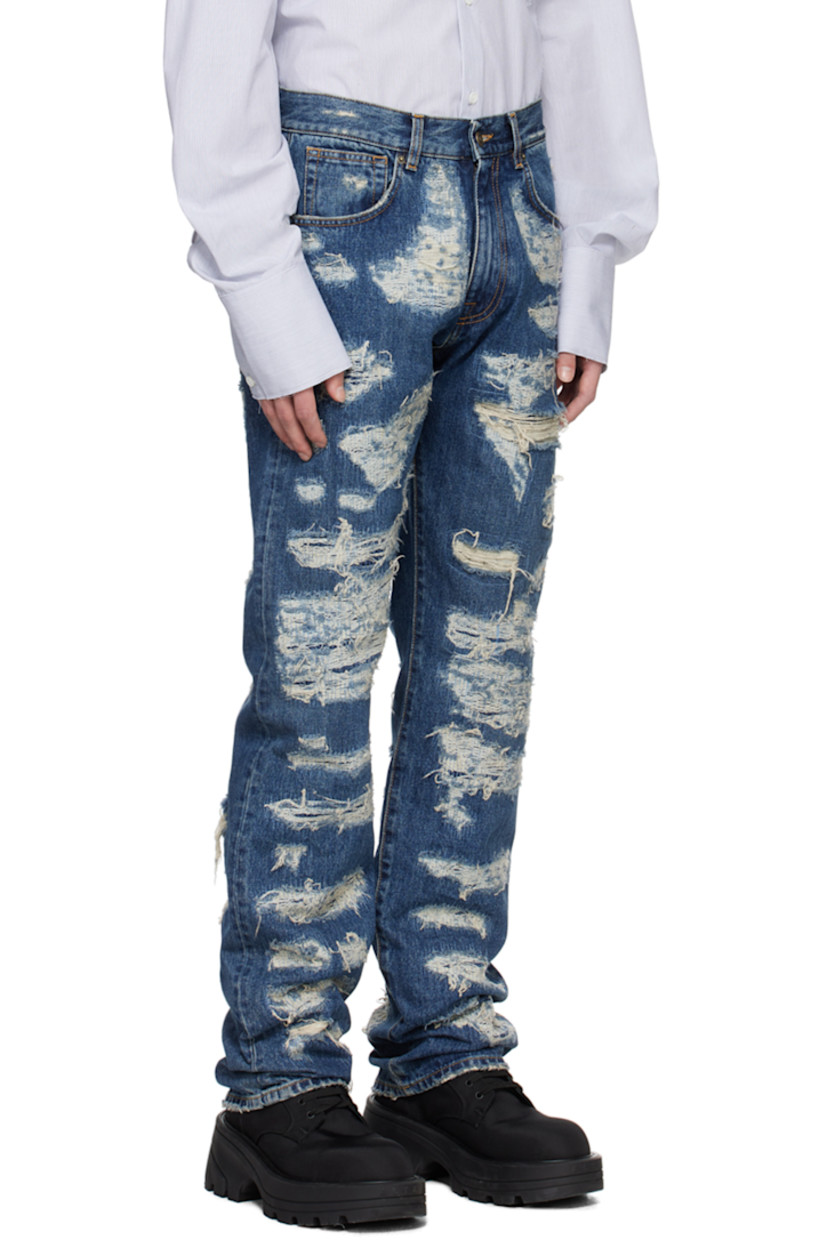 Hand-treated non-stretch denim jeans. Fading and distressing throughout.

· Belt loops
· Five-pocket styling
· Zip-fly
· Logo patch at back waistband
· Logo embroidered at back patch pocket

Supplier color: Destroyed