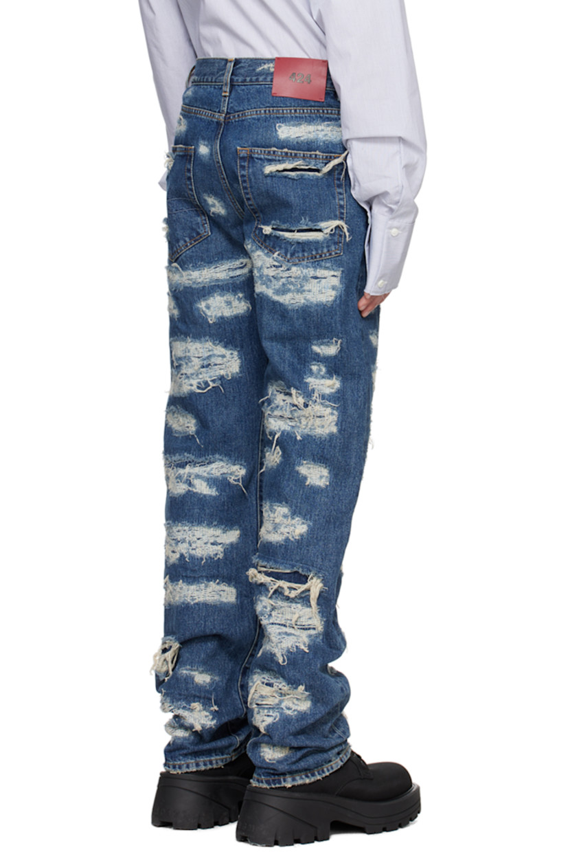 Hand-treated non-stretch denim jeans. Fading and distressing throughout.

· Belt loops
· Five-pocket styling
· Zip-fly
· Logo patch at back waistband
· Logo embroidered at back patch pocket

Supplier color: Destroyed