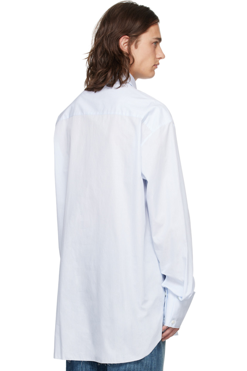 Cotton poplin shirt. Jacquard pinstripes throughout.

· Spread collar
· Concealed button closure
· Logo embroidered at front
· Raw edge at shirttail hem and cuffs
· Four-button extended barrel cuffs

Supplier color: White/Azur stripes