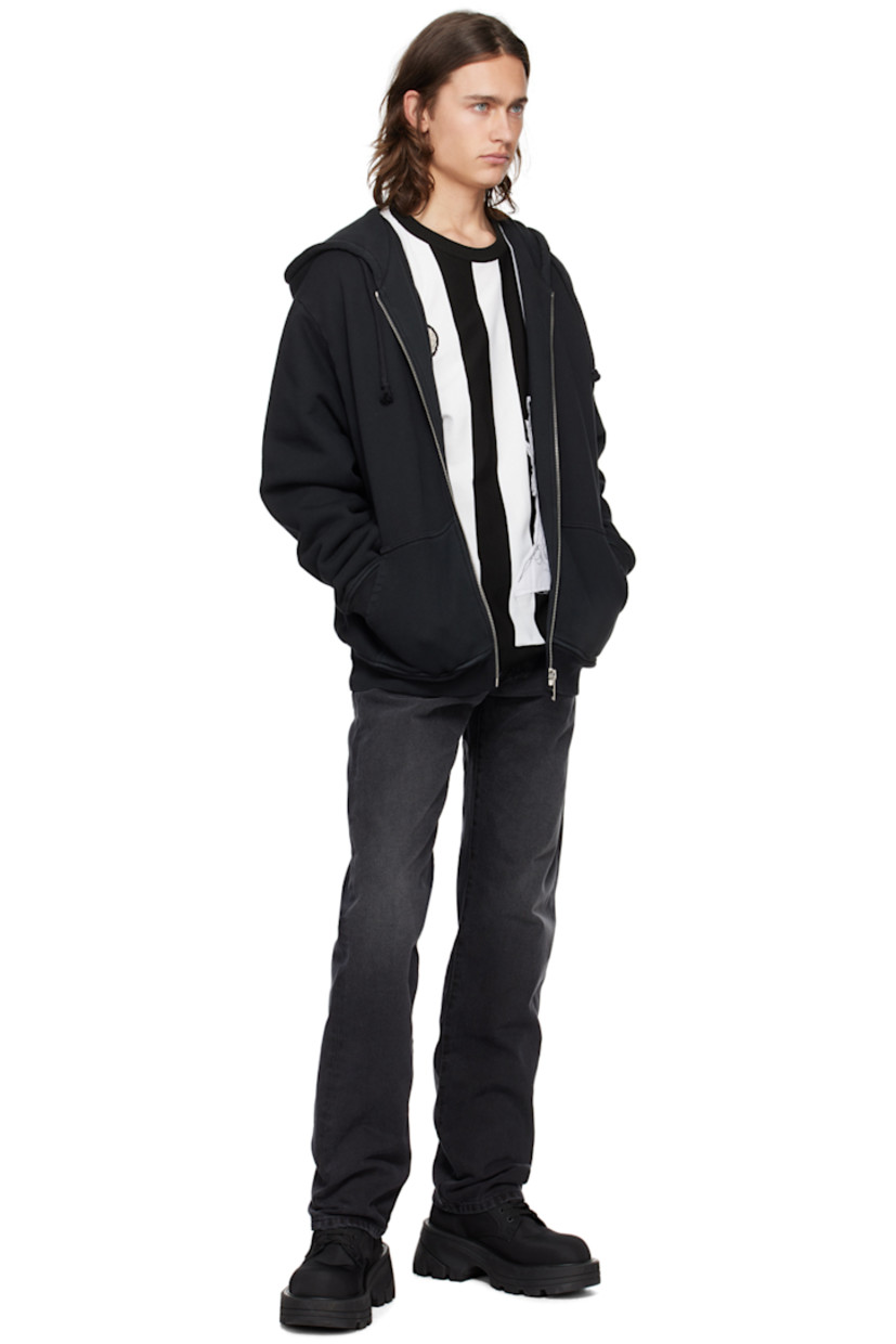 Hand-treated knit polypropylene sweater. Stripes throughout. 

· Rib knit crewneck, hem, and cuffs
· Logo appliqué at chest
· Graphic patch at front and back
· Dropped shoulders
· Felted logo patch at back collar 

Supplier color: Panna/Black