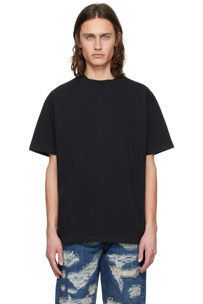 Hand-treated cotton jersey T-shirt. Fading throughout.

· Rib knit crewneck
· Dropped shoulders
· Logo embroidered at back

Supplier color: Black