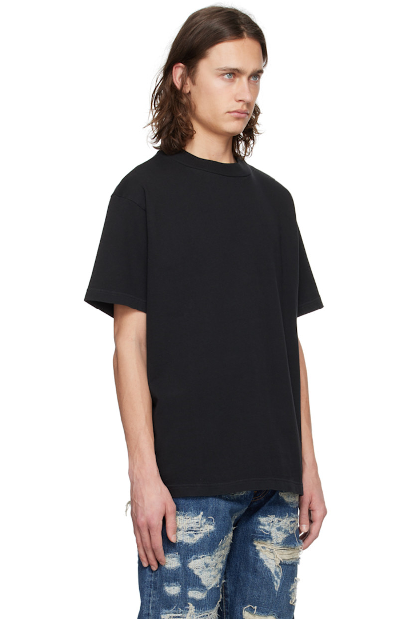 Hand-treated cotton jersey T-shirt. Fading throughout.

· Rib knit crewneck
· Dropped shoulders
· Logo embroidered at back

Supplier color: Black