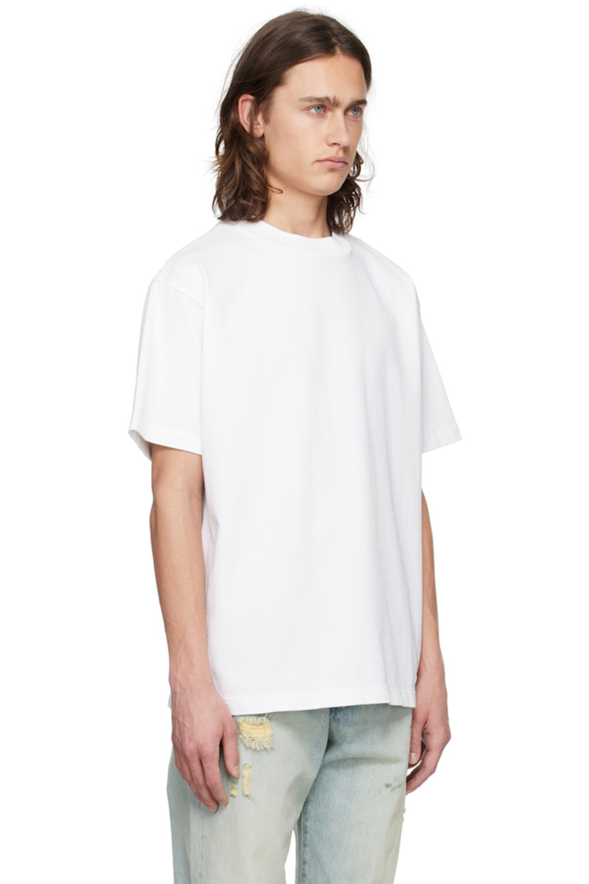 Cotton jersey T-shirt.

· Rib knit crewneck
· Dropped shoulders
· Logo embroidered at back

Supplier color: Panna