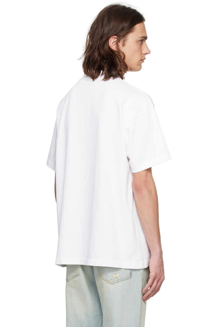 Cotton jersey T-shirt.

· Rib knit crewneck
· Dropped shoulders
· Logo embroidered at back

Supplier color: Panna