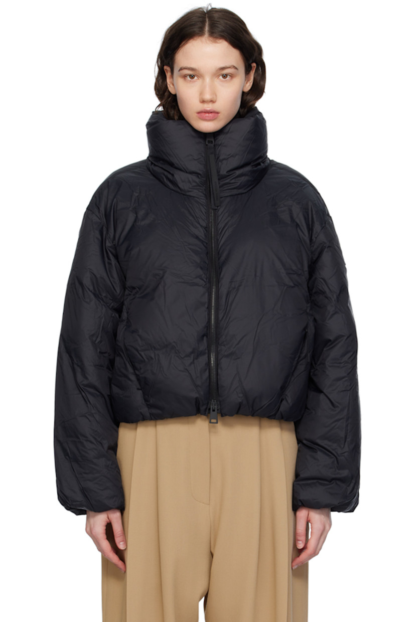 Down-filled nylon satin jacket. Wind-resistant, water-repellent, and lightweight.

· Funnel neck
· Two-way zip closure
· Bungee-style drawstring at cropped hem
· Seam zip pockets
· Embroidered logo patch at sleeve
· Elasticized cuffs
· Detachable shoulder straps at interior
· Full satin lining

Supplier color: Black

Fill: 90% duck down, 10% duck feather.