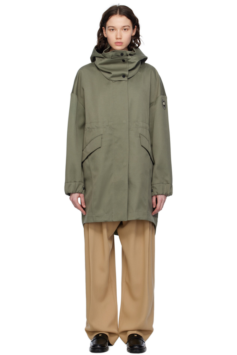 Polyester- and cotton-blend twill coat.

· Detachable hood at stand collar
· Two-way zip closure with press-stud placket
· Flap pockets
· Embroidered logo patch at sleeve
· Adjustable press-stud tab at elasticized cuffs
· Taped seams at interior
· Patch pockets at interior
· Bungee-style drawstring at interior waist
· Partial twill lining

Supplier color: Smokey sage