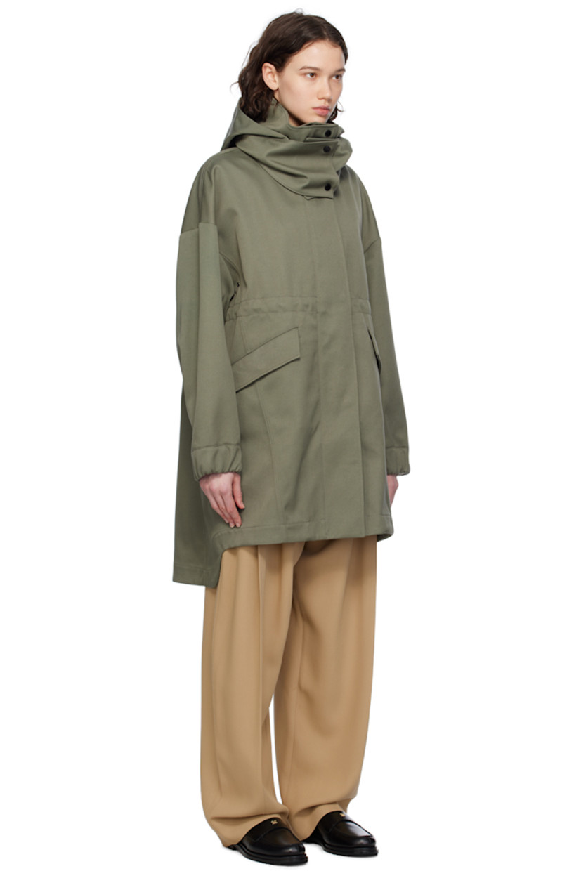 Polyester- and cotton-blend twill coat.

· Detachable hood at stand collar
· Two-way zip closure with press-stud placket
· Flap pockets
· Embroidered logo patch at sleeve
· Adjustable press-stud tab at elasticized cuffs
· Taped seams at interior
· Patch pockets at interior
· Bungee-style drawstring at interior waist
· Partial twill lining

Supplier color: Smokey sage