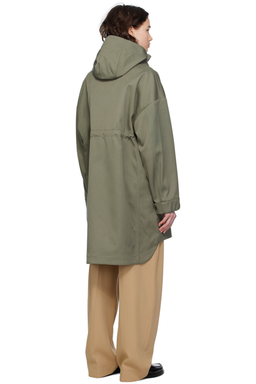 Polyester- and cotton-blend twill coat.

· Detachable hood at stand collar
· Two-way zip closure with press-stud placket
· Flap pockets
· Embroidered logo patch at sleeve
· Adjustable press-stud tab at elasticized cuffs
· Taped seams at interior
· Patch pockets at interior
· Bungee-style drawstring at interior waist
· Partial twill lining

Supplier color: Smokey sage