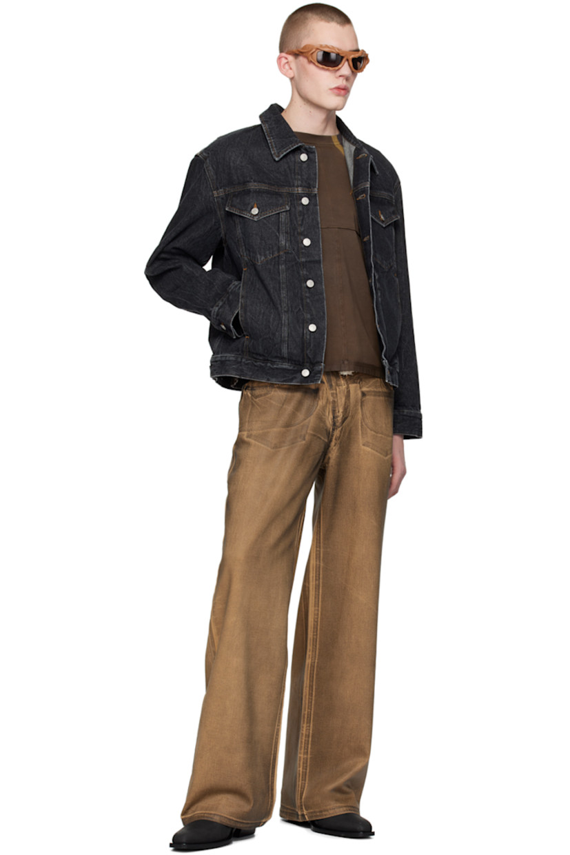 Handcrafted stretch cotton-blend denim jeans. Graphic pattern printed throughout.

· Belt loop and frayed edge at layered waistband
· Drawstring and strap at waistband
· Five-pocket styling
· Offset zip-fly
· Rubberized logo patch at back waistband
· Logo flag at back patch pocket
· Logo-engraved gunmetal-tone hardware

Wholesale exclusivity at SSENSE.

Supplier color: Brown/Black paint