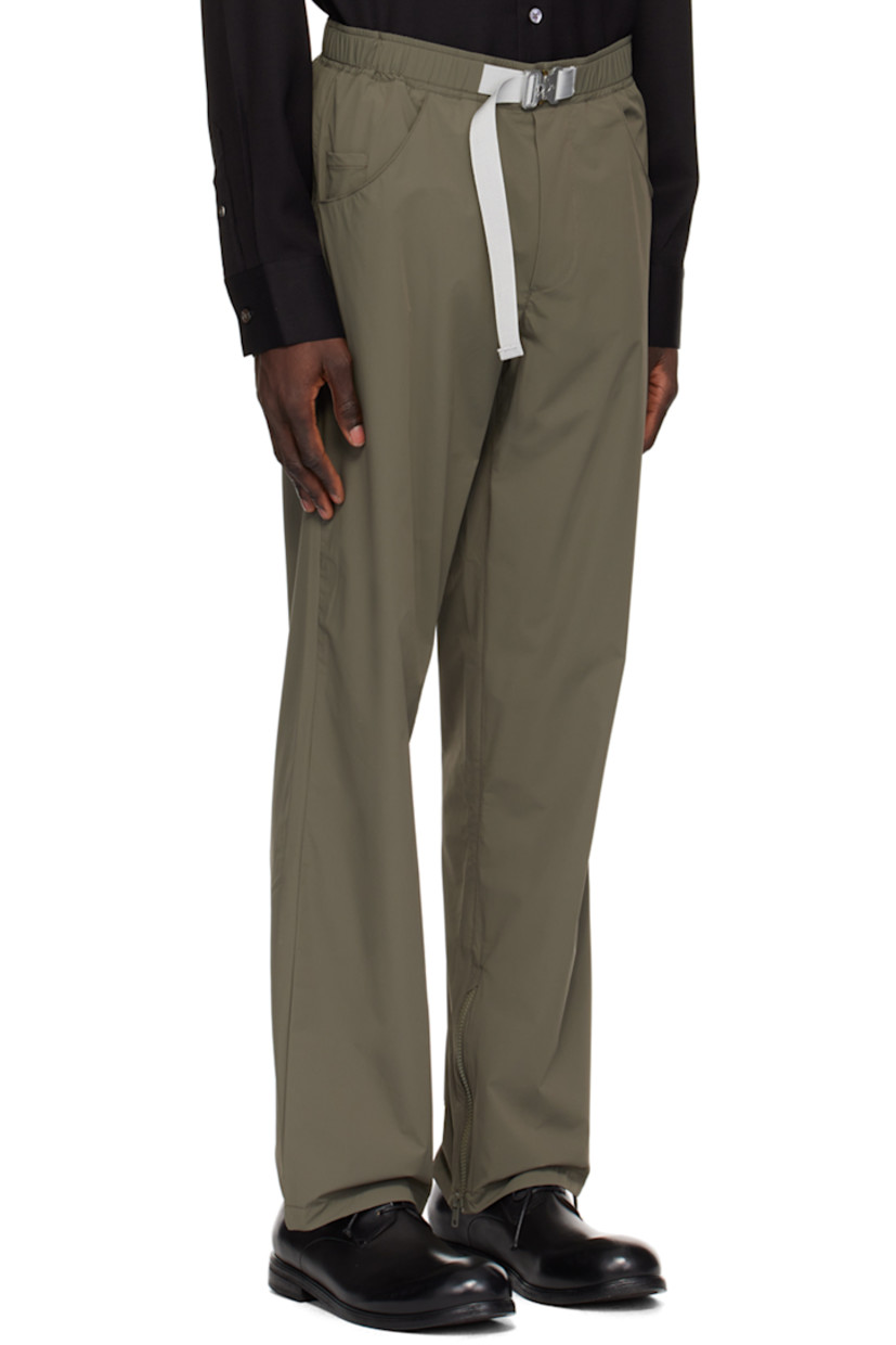 Lightweight stretch nylon taffeta trousers.

· Integrated press-release belt at elasticized waistband
· Four-pocket styling
· Mock-fly
· Zip vent at cuffs

Supplier color: Rock
