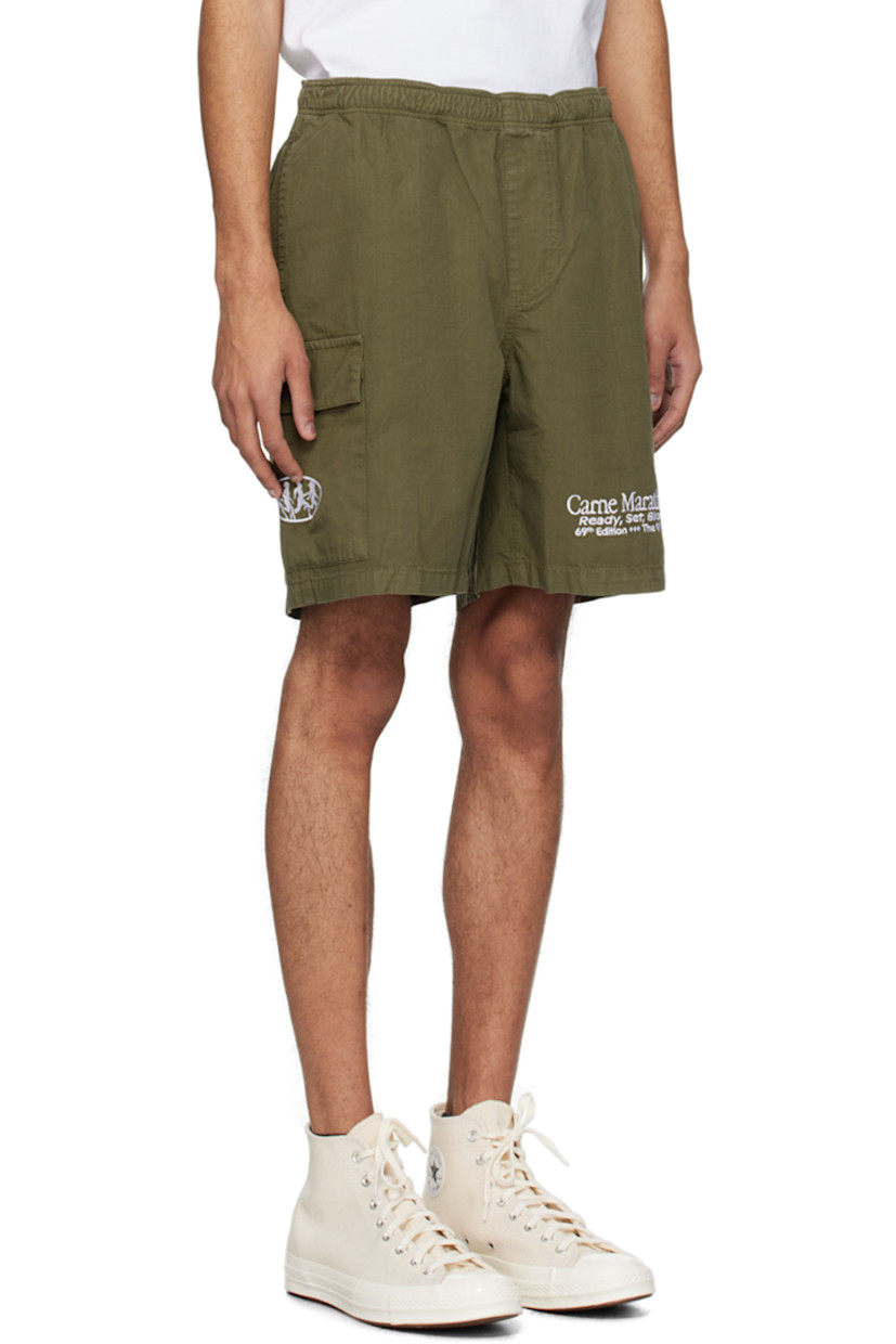 Cotton ripstop shorts.

· Concealed drawstring at elasticized waistband
· Three-pocket styling
· Mock-fly
· Text embroidered at front
· Flap pocket and embroidered graphic at outseam

Supplier color: Khaki