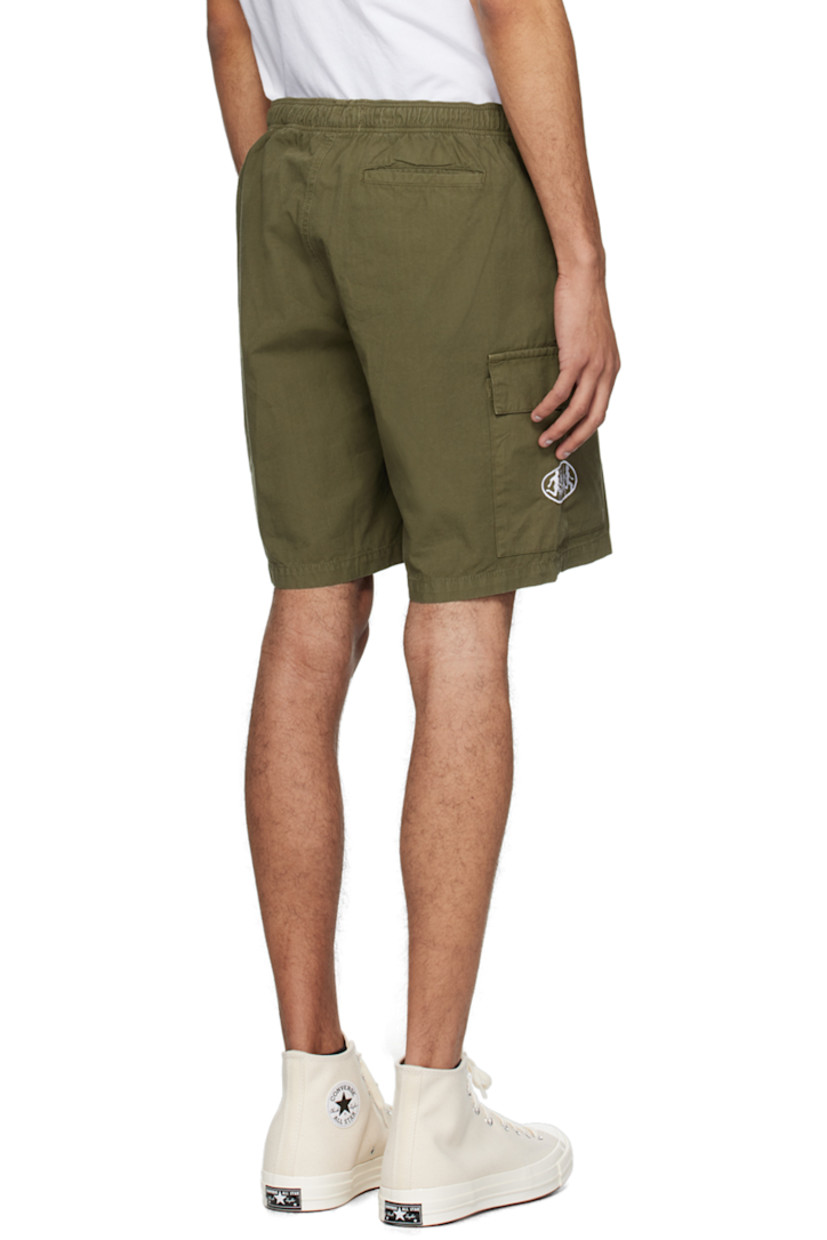 Cotton ripstop shorts.

· Concealed drawstring at elasticized waistband
· Three-pocket styling
· Mock-fly
· Text embroidered at front
· Flap pocket and embroidered graphic at outseam

Supplier color: Khaki