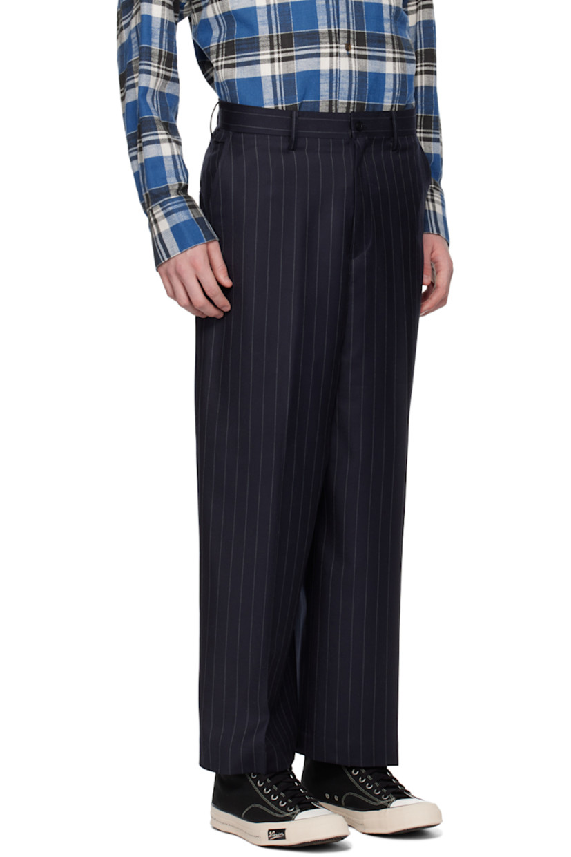 Wool gabardine trousers. Pinstripes throughout.

· Belt loops
· Four-pocket styling
· Zip-fly
· Central creases at front and back
· Logo patch at cuff

This item is part of a limited run of 20.

Supplier color: Black