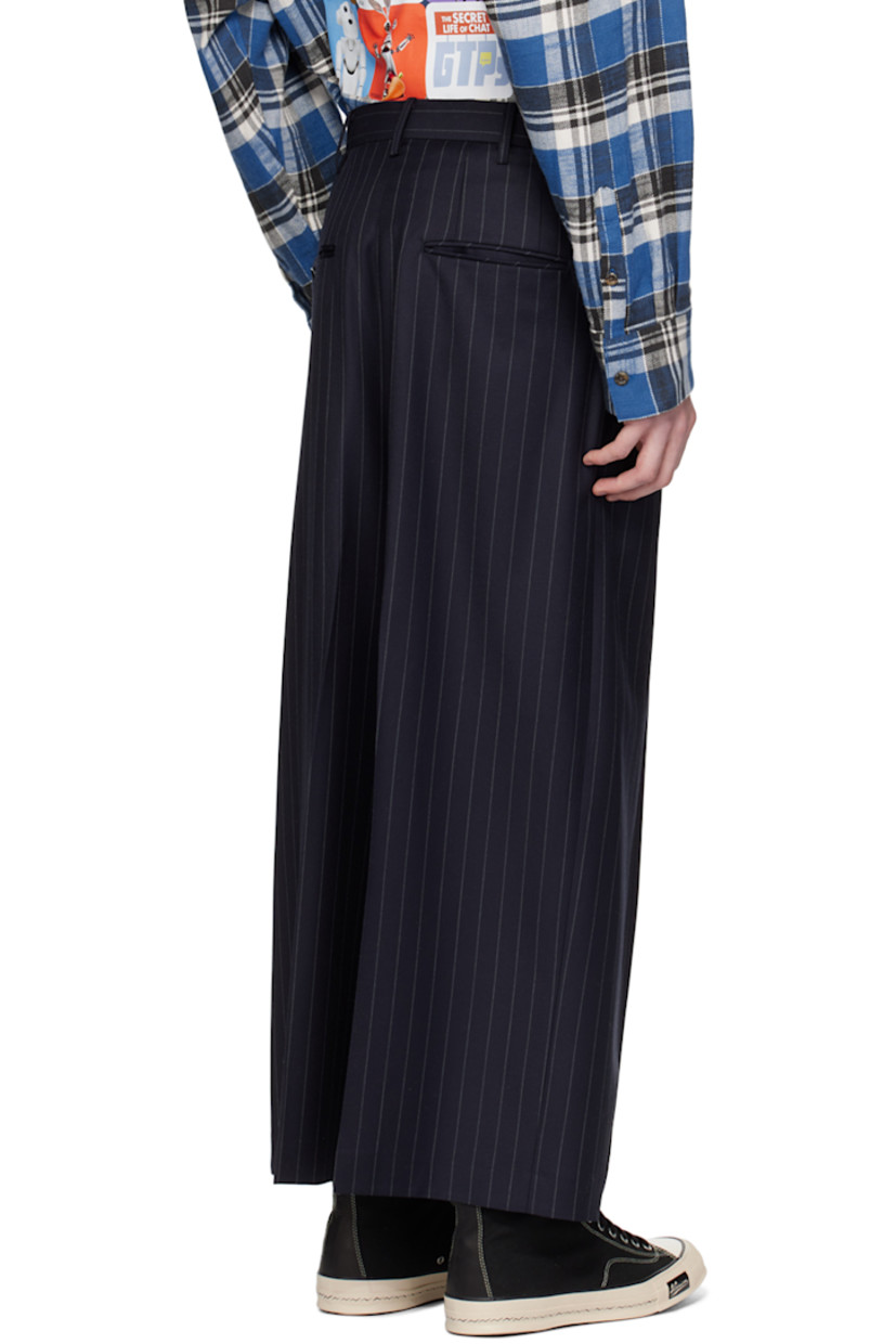 Wool gabardine trousers. Pinstripes throughout.

· Belt loops
· Four-pocket styling
· Zip-fly
· Central creases at front and back
· Logo patch at cuff

This item is part of a limited run of 20.

Supplier color: Black