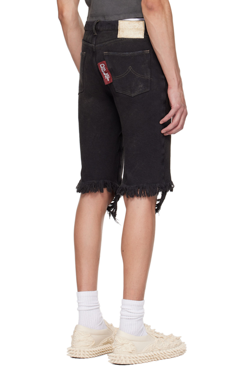 Brushed cotton twill shorts. Fading throughout. 

· Belt loops
· Five-pocket styling
· Zip-fly
· Frayed edge at cuffs 
· Logo patch at back waistband
· Logo flag at back pocket

This item is part of a limited run of 17.

Supplier color: Black