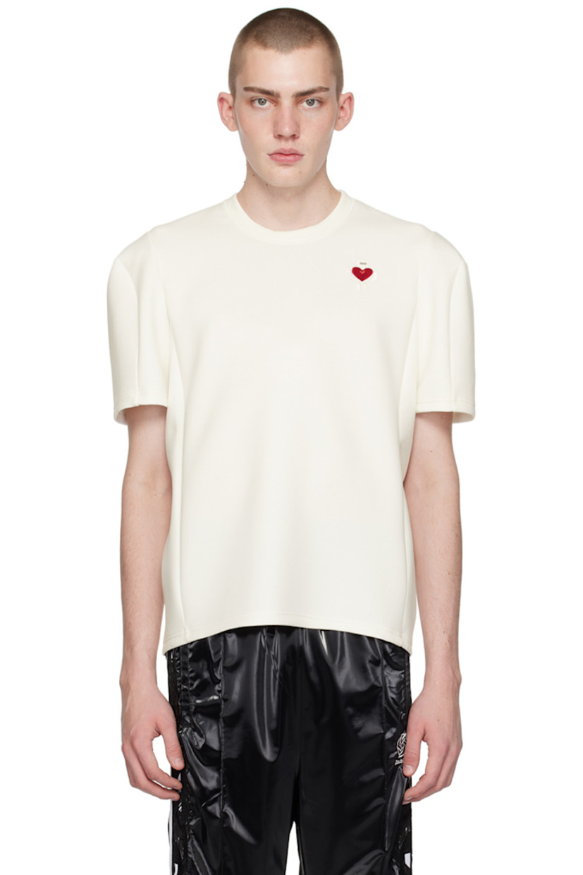 Stretch polyester-blend bonded jersey T-shirt.

· Rib knit crewneck
· Graphic embroidered at chest
· Structured shoulders

This item is part of a limited run of 79.
 
Supplier color: White