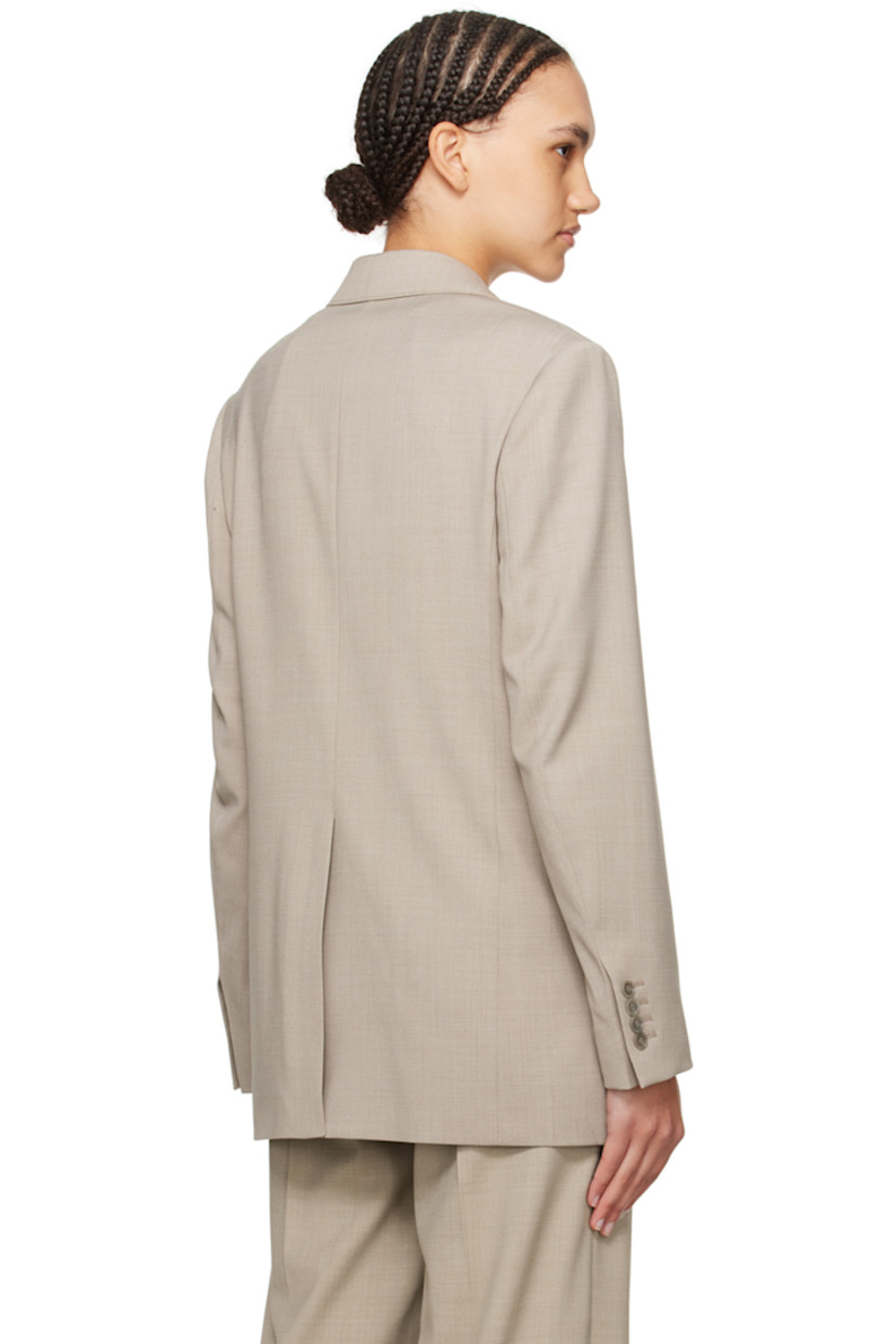 Stretch polyester- and wool-blend hopsack blazer.

· Notched lapel
· Two-button closure
· Welt pocket at chest
· Flap pockets
· Four-button surgeon's cuffs
· Central vent at back hem
· Welt pocket at interior
· Full satin lining
· Horn hardware

Supplier color: Sage melange