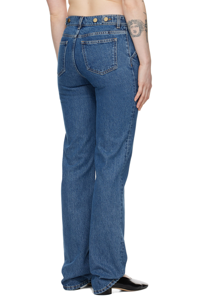 Slim-fit non-stretch TENCEL™ lyocell-blend denim jeans. Subtle fading throughout.

· Low-rise
· Belt loops
· Four-pocket styling
· Zip-fly
· Button fastening at front pockets 
· Adjustable button tabs at back waistband 

Supplier color: Washed mid blue