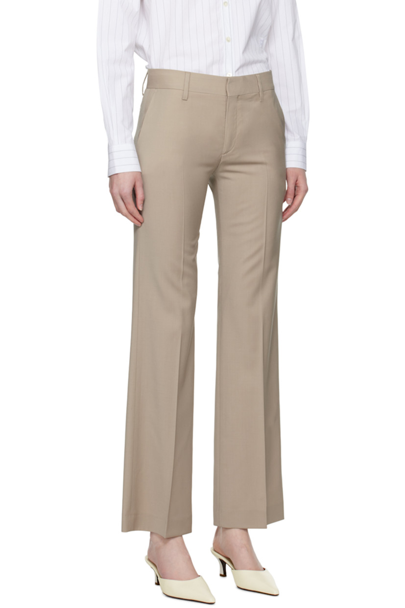 Stretch wool broadcloth trousers.

· Low-rise
· Belt loops
· Three-pocket styling
· Zip-fly
· Creased legs

Supplier color: Dessert Taupe
