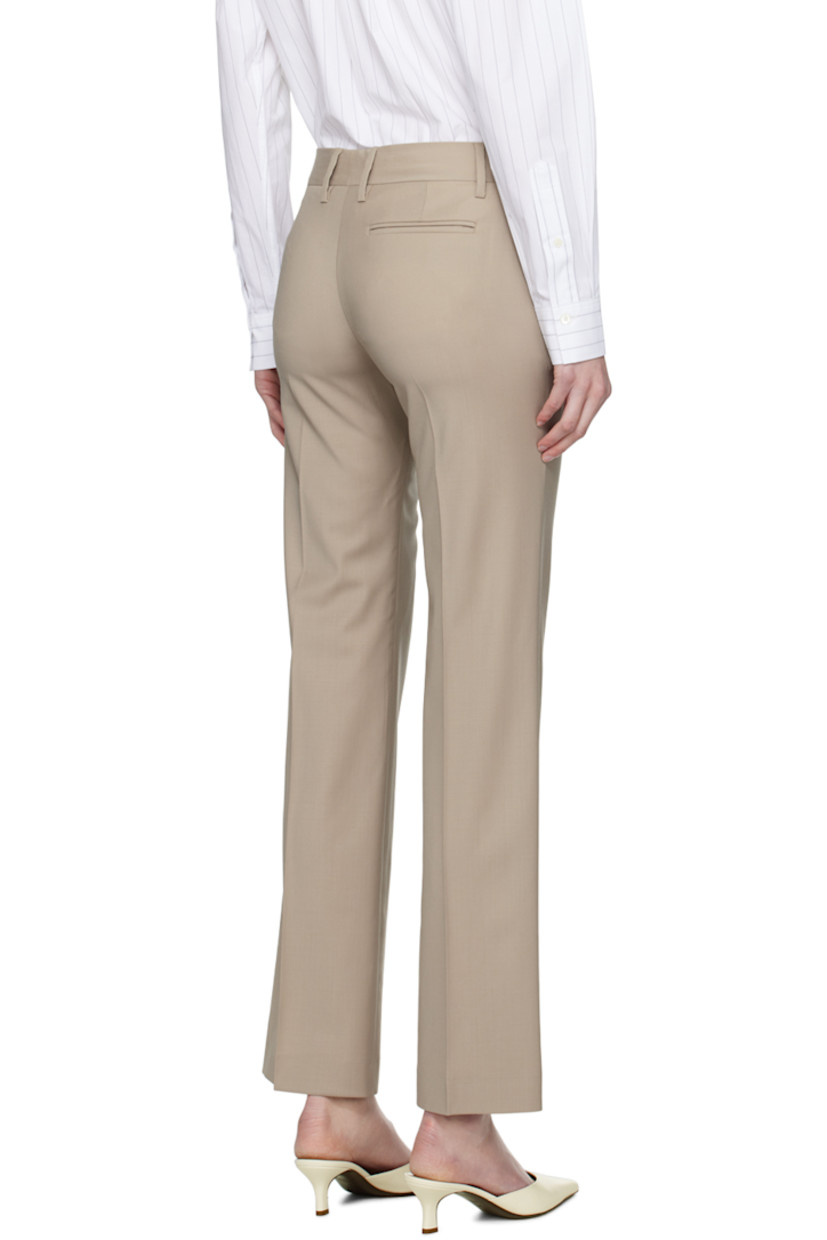 Stretch wool broadcloth trousers.

· Low-rise
· Belt loops
· Three-pocket styling
· Zip-fly
· Creased legs

Supplier color: Dessert Taupe