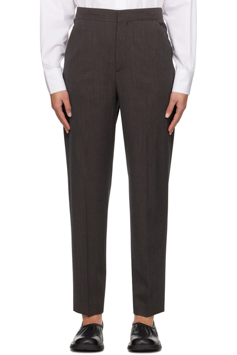 Tapered stretch wool delaine trousers.

· Low-rise
· Four-pocket styling
· Zip-fly
· Creased legs
· Cinch strap at back waist

Supplier color: Dark oak melange