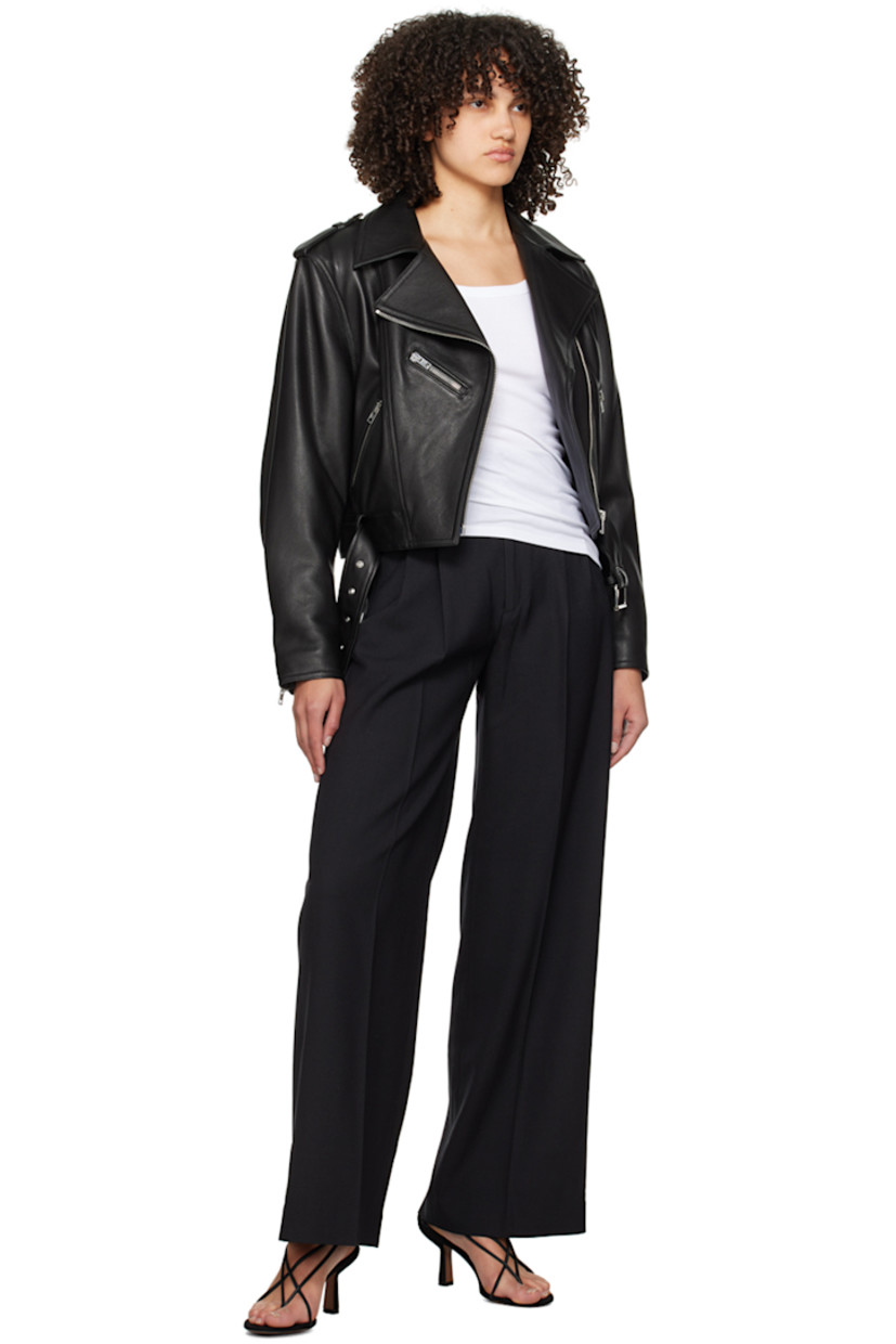 Wide-leg stretch polyester- and mulesing-free wool-blend broadcloth trousers.  

· High-rise 
· Belt loops 
· Pleats at waistband
· Four pocket styling
· Zip-fly
· Extended cuffs

Supplier color: Black