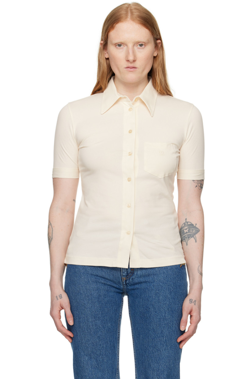 Stretch organic cotton jersey shirt. 

· Spread collar 
· Button closure 
· Text embroidered at patch pocket 
· Rolled cuffs

Part of the 1993 collection.

Supplier color: Ivory