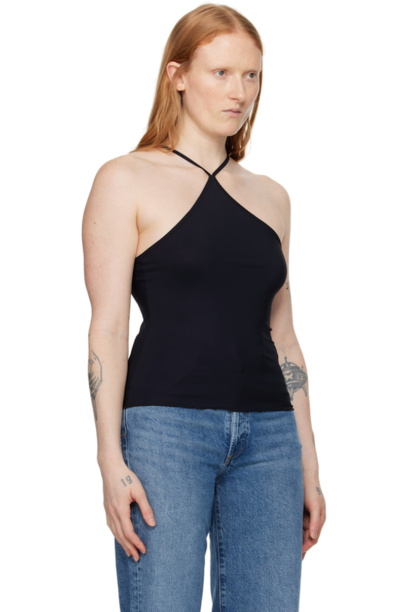 Stretch nylon jersey tank top.

· Single-shoulder construction
· Lettuce edge hem 
· Open back
· Fixed spaghetti straps

Supplier color: Black