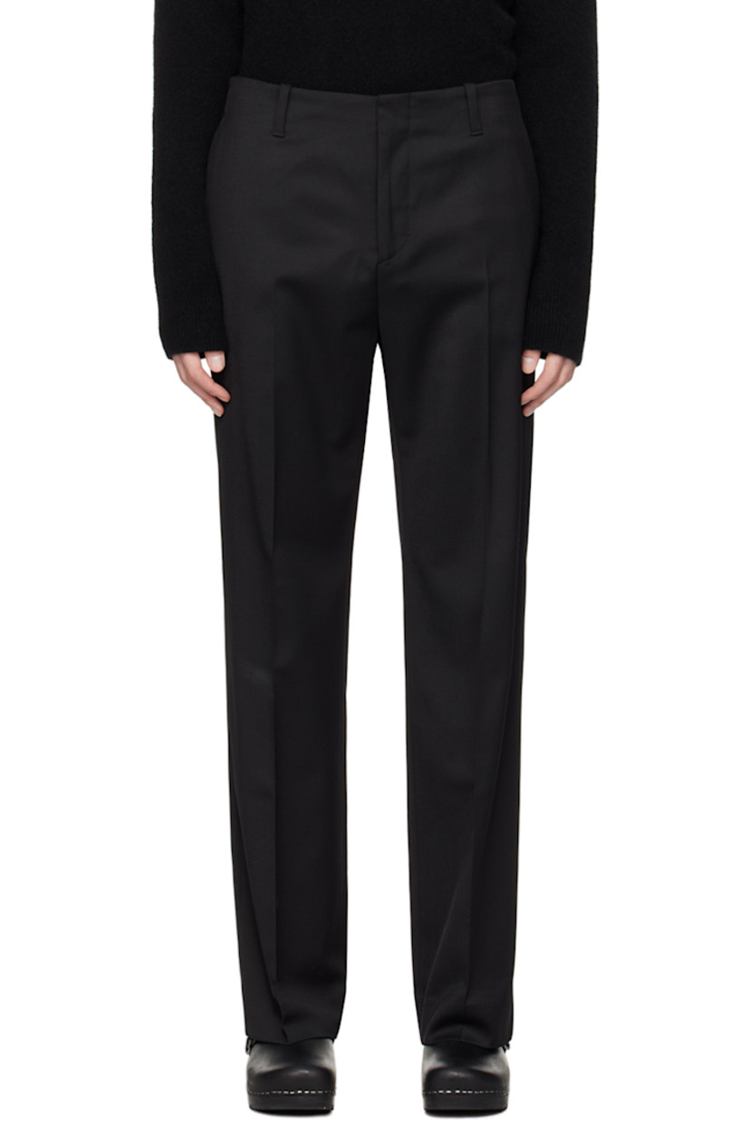Stretch polyester- and wool twill trousers.

· Belt loops
· Four-pocket styling
· Zip-fly
· Central crease at front and back

Supplier color: Black