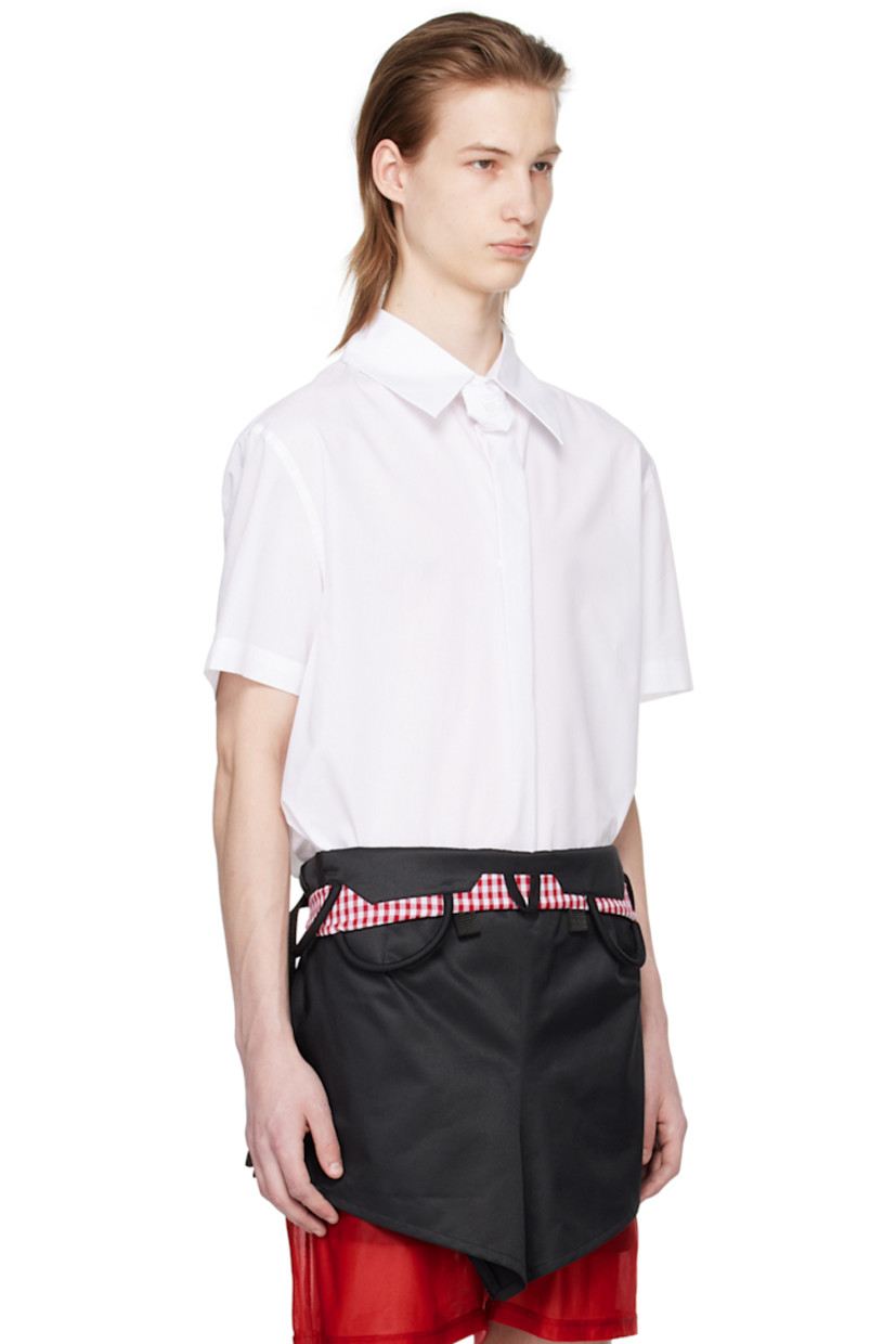 Cotton poplin shirt. 

· Logo-embroidered tie-style trim at spread collar 
· Box pleat at front 
· Vented back collar
· Zip closure and pleats at back

Supplier color: White