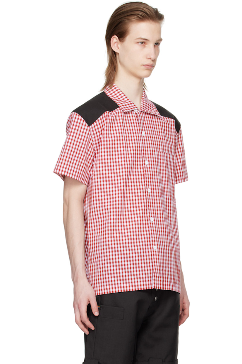 Cotton-blend poplin shirt. Gingham pattern throughout. 

· Spread collar 
· Button closure 
· Patch pocket 
· Canvas panel at shoulders and back yoke
· Logo embroidered at back collar
· Logo flag at back yoke

Supplier color: Red gingham/Black