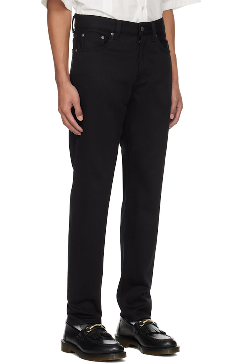 Slim-fit tapered stretch 12 oz organic cotton denim jeans. GOTS-, FSC-, and GRS-certified.

· Belt loops
· Five-pocket styling
· Zip-fly
· Jacron logo patch at back waistband
· Logo flag at back pocket
· Logo-engraved antiqued silver-tone hardware

Supplier color: Dry everblack