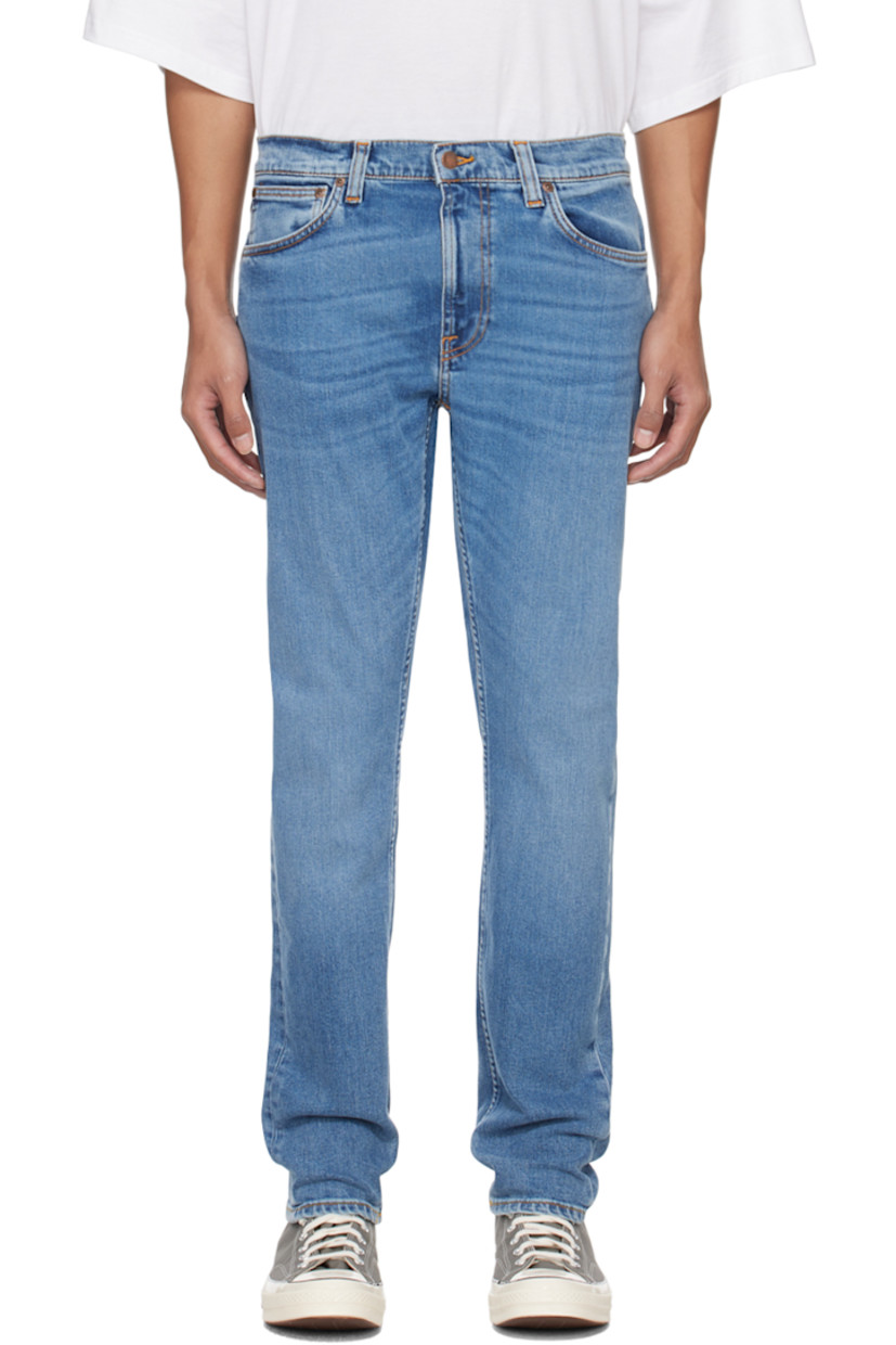 Slim-fit tapered 12.5 oz stretch organic cotton denim jeans. Fading and whiskering throughout. 

· GOTS-, FSC-, and GRS-certified
· Belt loops
· Five-pocket styling
· Zip-fly
· Jacron logo patch at back waistband
· Logo flag at back pocket
· Logo-engraved antiqued copper-tone hardware
· Contrast stitching in orange

Supplier color: Lost orange