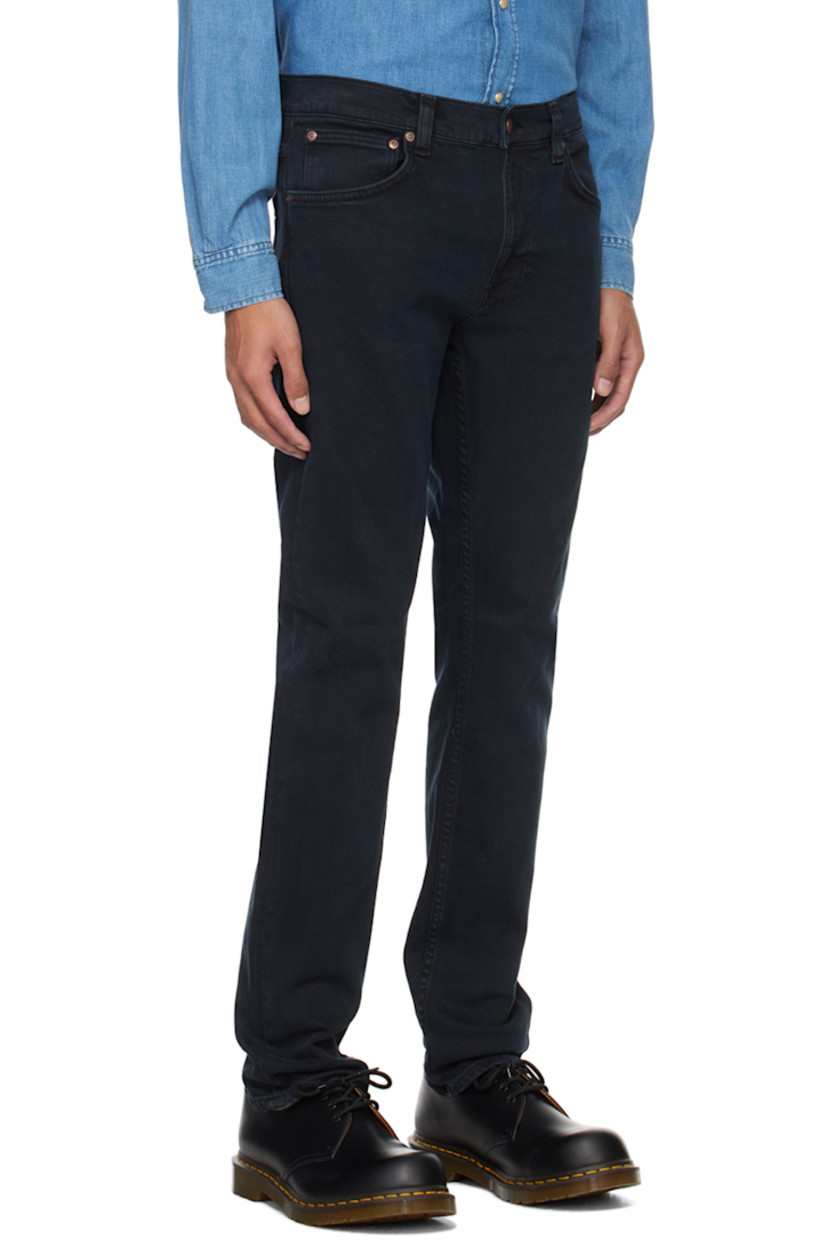 Slim-fit tapered 12.5 oz stretch organic cotton denim jeans. GOTS-, FSC-, and OCS-certified.

· Fading throughout
· Belt loops
· Five-pocket styling
· Button-fly
· Jacron logo patch at back waistband
· Logo patch at back pocket 
· Logo-engraved copper-tone hardware

Supplier color: Black skies