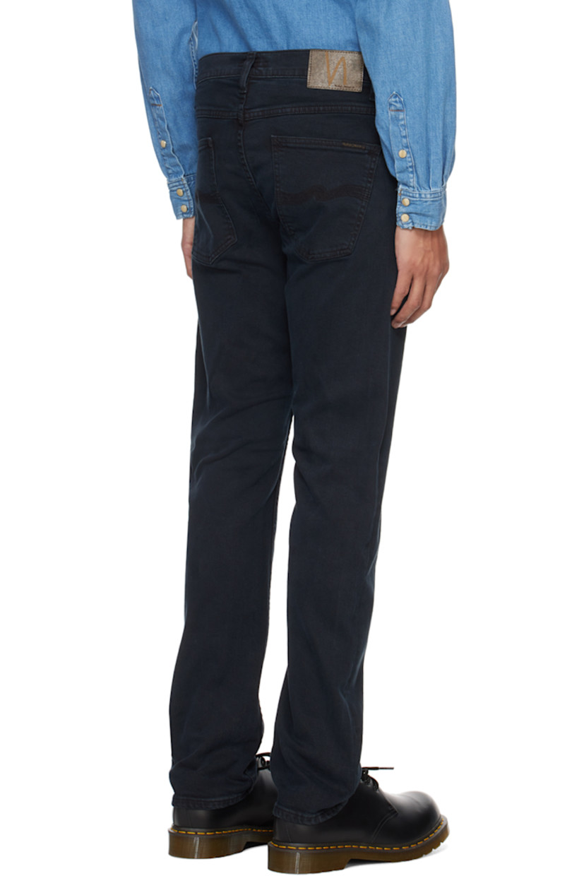 Slim-fit tapered 12.5 oz stretch organic cotton denim jeans. GOTS-, FSC-, and OCS-certified.

· Fading throughout
· Belt loops
· Five-pocket styling
· Button-fly
· Jacron logo patch at back waistband
· Logo patch at back pocket 
· Logo-engraved copper-tone hardware

Supplier color: Black skies
