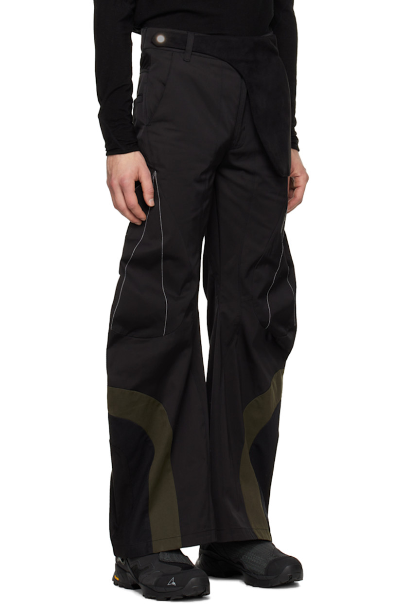Flared polyester- and cotton-blend twill trousers.

· Belt loops and integrated faux-suede pouch
· Four-pocket styling
· Zip-fly
· Faux-suede, mesh, and canvas panel at cuffs
· Contrast stitching in white

Supplier color: Black