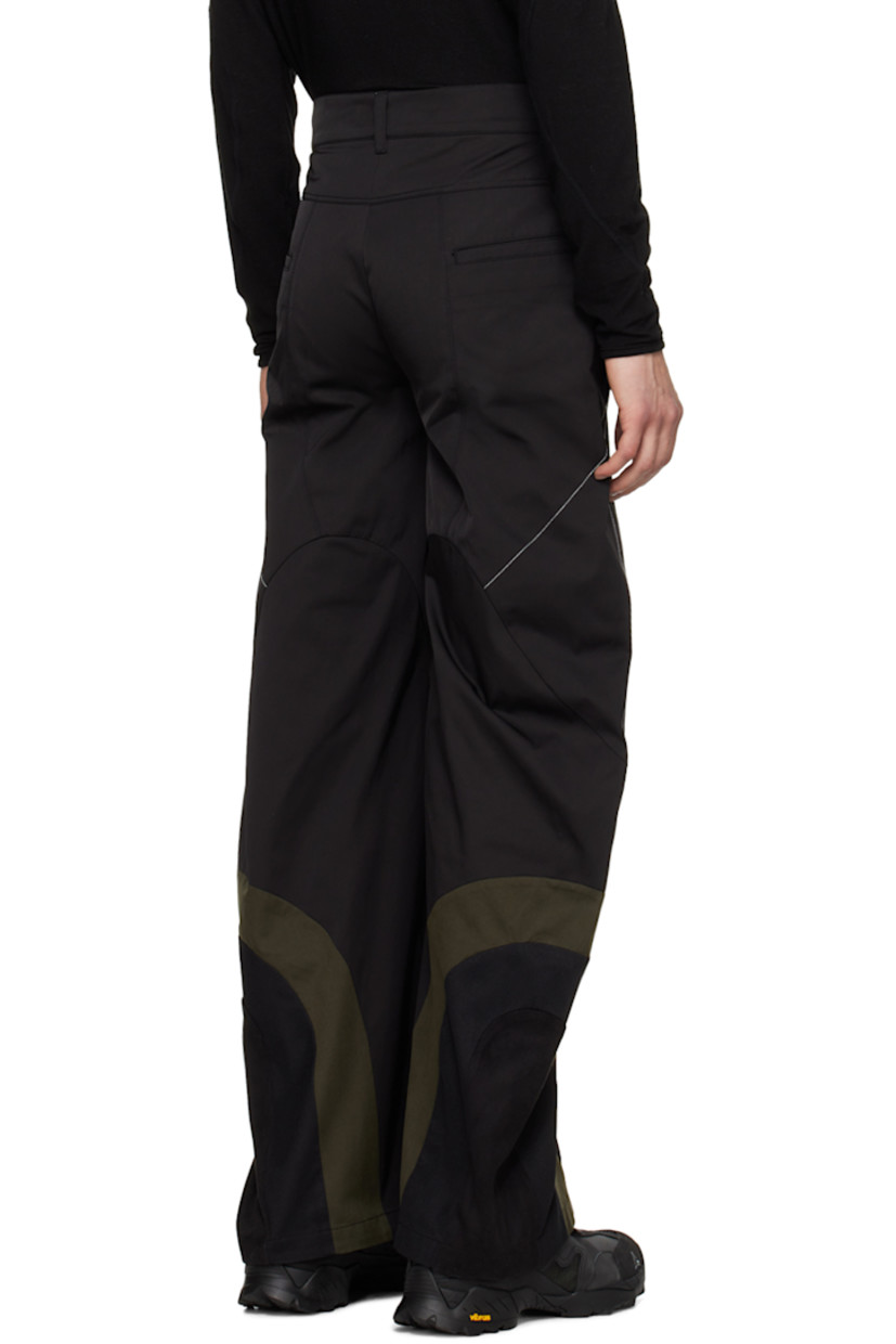 Flared polyester- and cotton-blend twill trousers.

· Belt loops and integrated faux-suede pouch
· Four-pocket styling
· Zip-fly
· Faux-suede, mesh, and canvas panel at cuffs
· Contrast stitching in white

Supplier color: Black