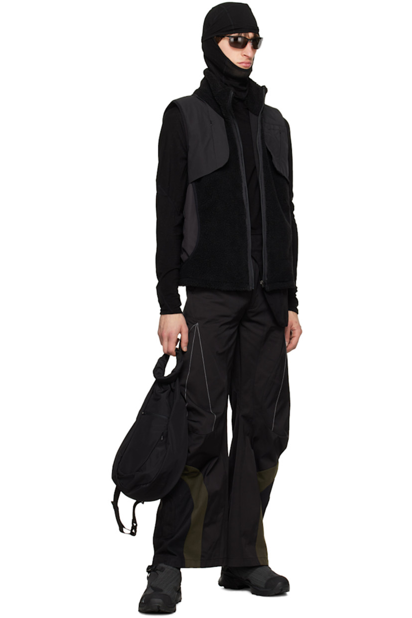 Flared polyester- and cotton-blend twill trousers.

· Belt loops and integrated faux-suede pouch
· Four-pocket styling
· Zip-fly
· Faux-suede, mesh, and canvas panel at cuffs
· Contrast stitching in white

Supplier color: Black