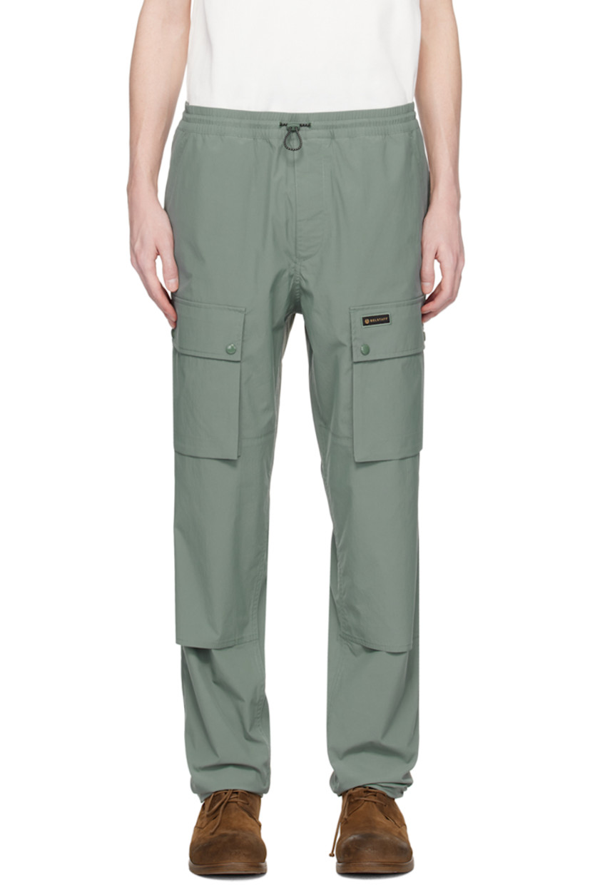 Relaxed-fit polyester taffeta trousers. Water-repellent, quick-drying, and UV protection.

· Bungee-style drawstring at elasticized waistband 
· Four-pocket styling 
· Zip-fly
· Logo patch at front and back
· Reinforced panel at knees
· Concealed bungee-style drawstring at cuffs
· Bellows pocket at outseams
· Unlined

Supplier color: Mineral green