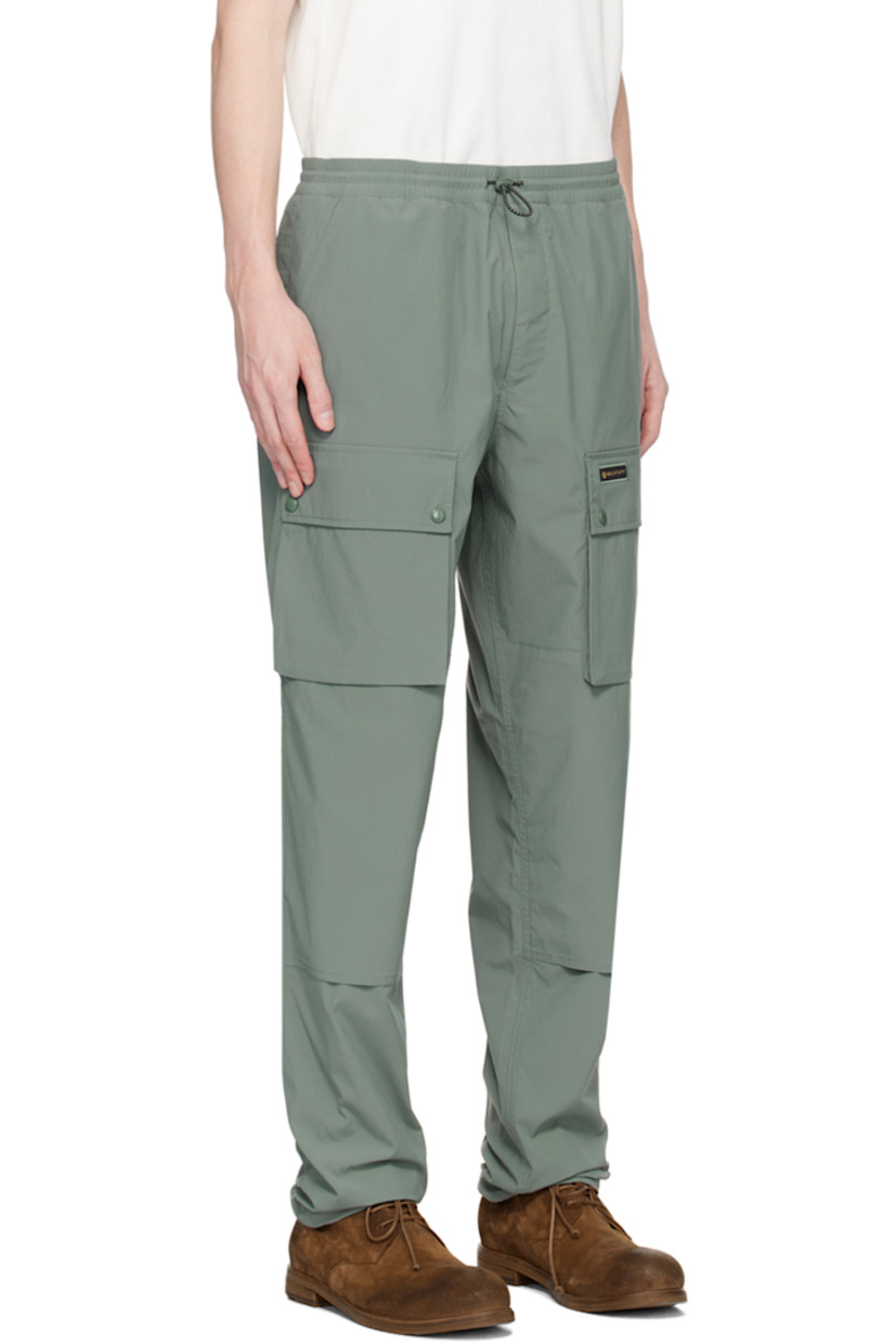 Relaxed-fit polyester taffeta trousers. Water-repellent, quick-drying, and UV protection.

· Bungee-style drawstring at elasticized waistband 
· Four-pocket styling 
· Zip-fly
· Logo patch at front and back
· Reinforced panel at knees
· Concealed bungee-style drawstring at cuffs
· Bellows pocket at outseams
· Unlined

Supplier color: Mineral green