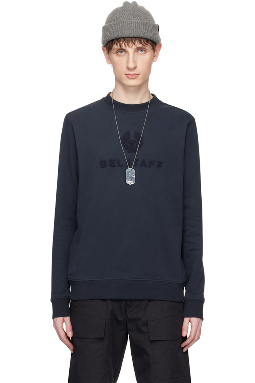 French terry sweatshirt. Fading throughout. 

· Rib knit crewneck, hem, and cuffs
· Chenille logo appliqué at front 

Supplier color: Dark ink