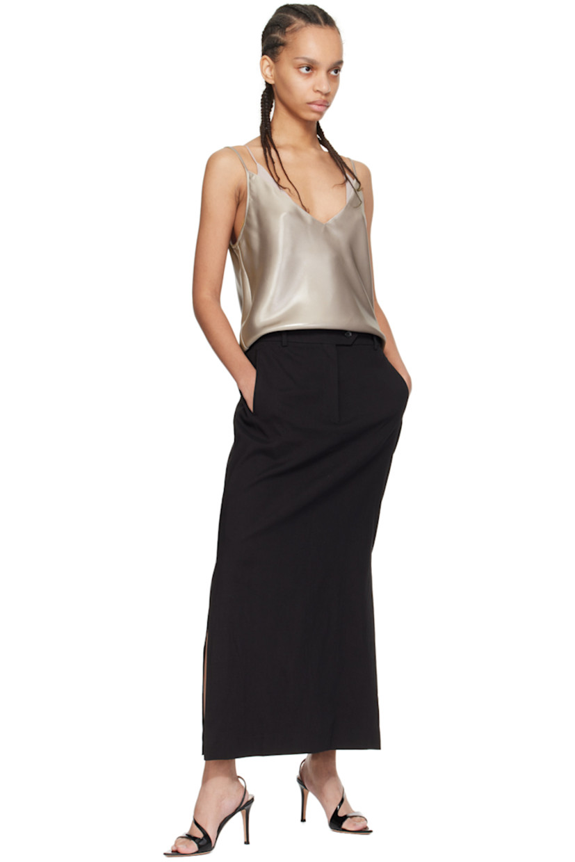 Polyester- and recycled polyester-blend satin camisole. Metallic thread detailing throughout.

· Layered construction
· Plunging V-neck
· Fixed spaghetti straps

Supplier color: Open beige