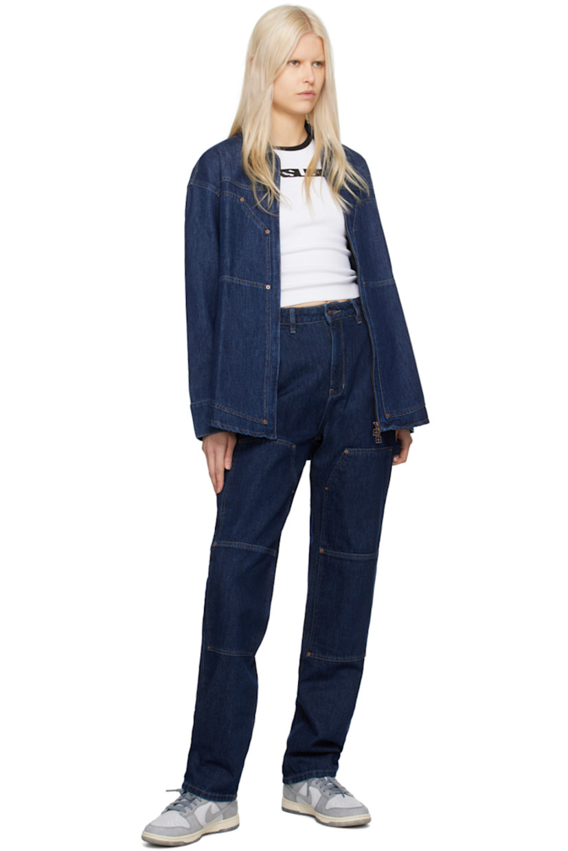 Relaxed-fit tapered non-stretch cotton- and recycled cotton-blend denim jeans. Lightweight.

· High-rise
· Belt loops
· Four-pocket styling
· Zip-fly
· Panel at knees
· Hammer loop at outseam
· Logo graphic embroidered at back
· Removable logo flag at back pocket
· Contrasting stitching in tan

Supplier color: Denim